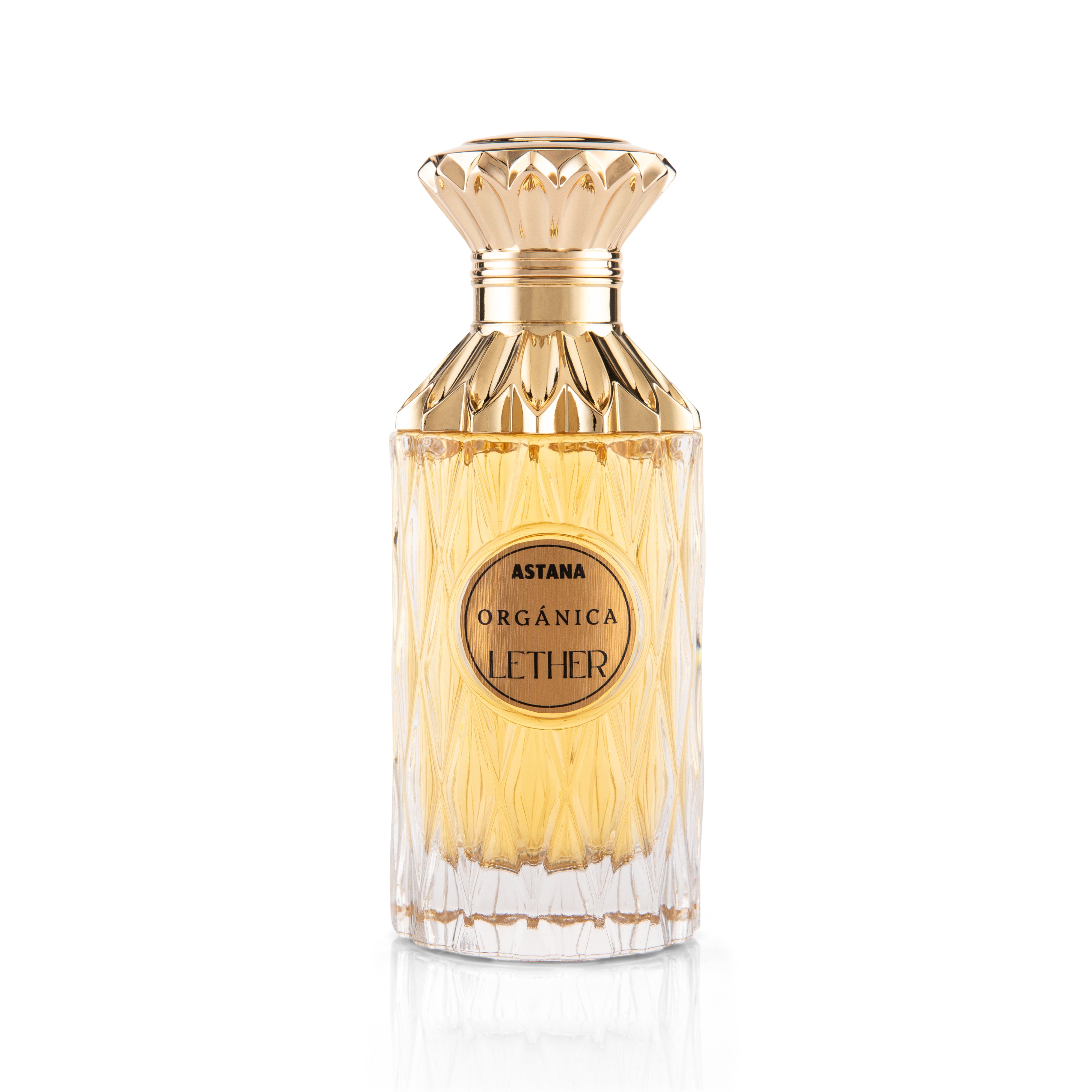 ORGANICA LETHER EXTRAIT DE PERFUM 100 ML BY ATTAR DE ASTANA Perfume bottle with gold cap and clear body on a white background